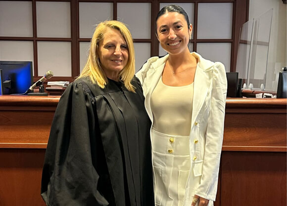 Victoria R. Caputo poses with the Honorable Judge Joanne Cocchiola